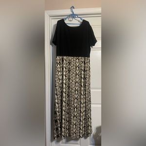 Plus Size Dress bought off Amazon.  Worn 1 time. Size 26.  Lots of stretch